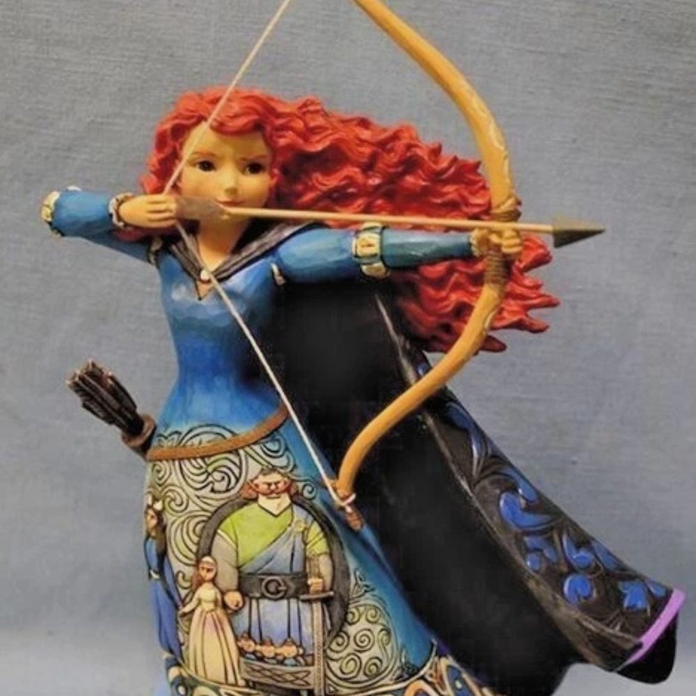 Disney Princess Merida Figurine with Associated Art Book.